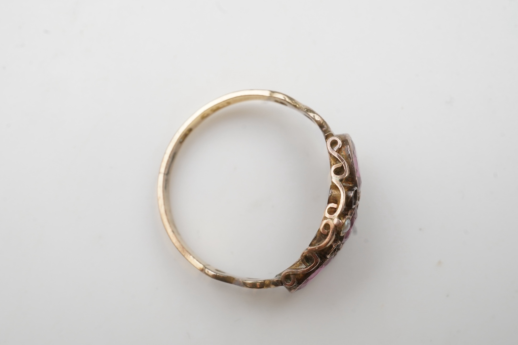 A Victorian garnet and seed pearl ring, mid 19th century